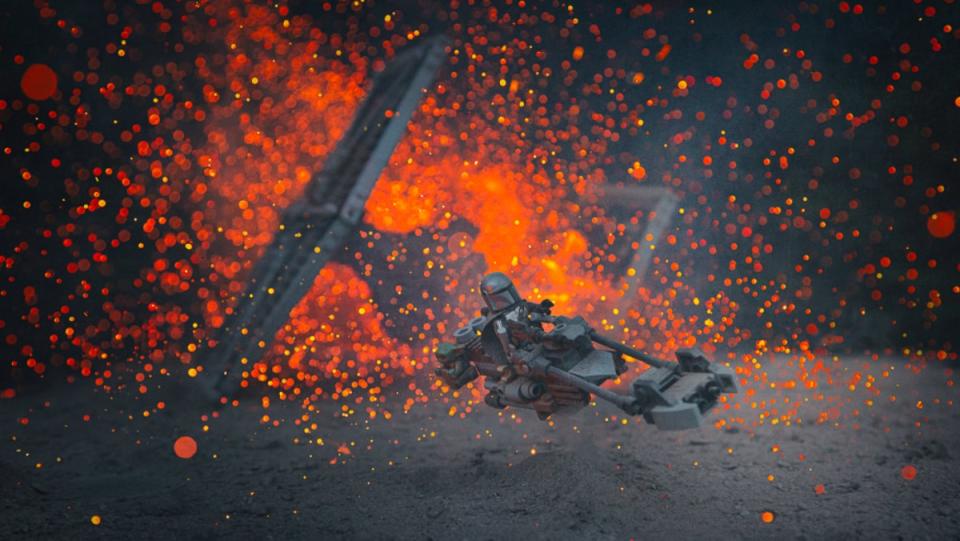 Star Wars Lego Scene Creation of Boba Fett flying away from an explosion