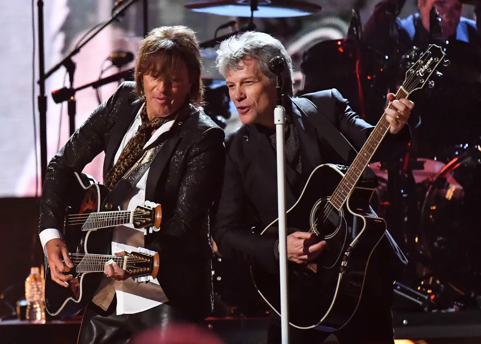  Jon Bon Jovi and Richie Sambora of Bon Jovi perform with guitars during the Rock & Roll Hall of Fame induction ceremony in 2018.