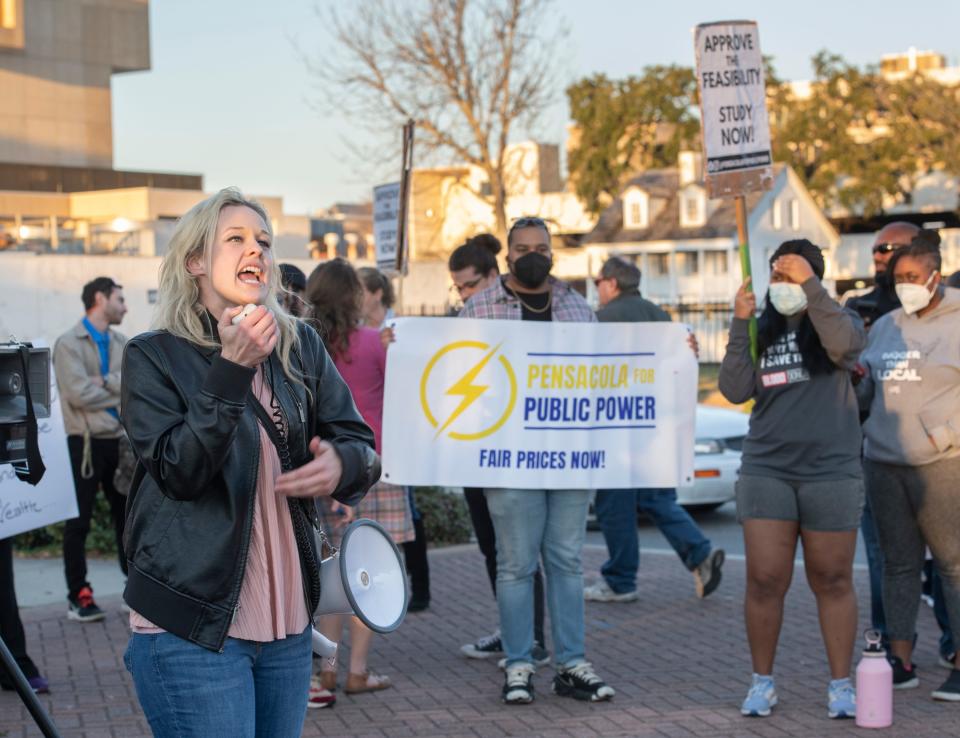 Rebekah Jones speaks as a crowd protests higher power bills in front of Pensacola City Hall before a meeting Feb. 10.