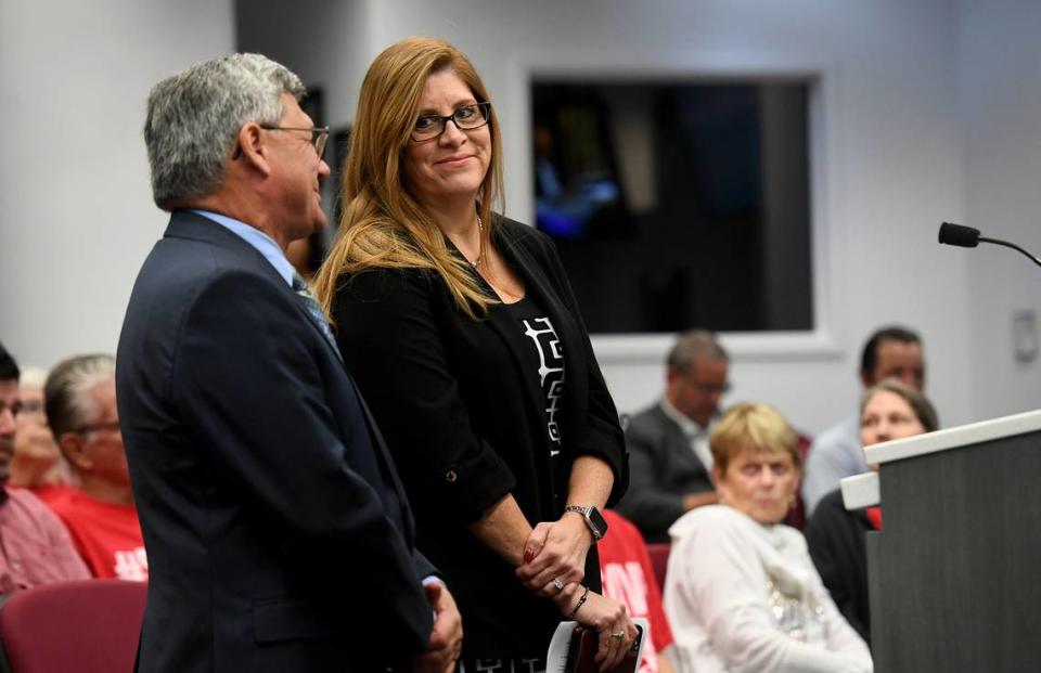 Sheila McLean smiles with Scott Hopes after becoming the county’s Chief Financial Officer November 29, 2022.