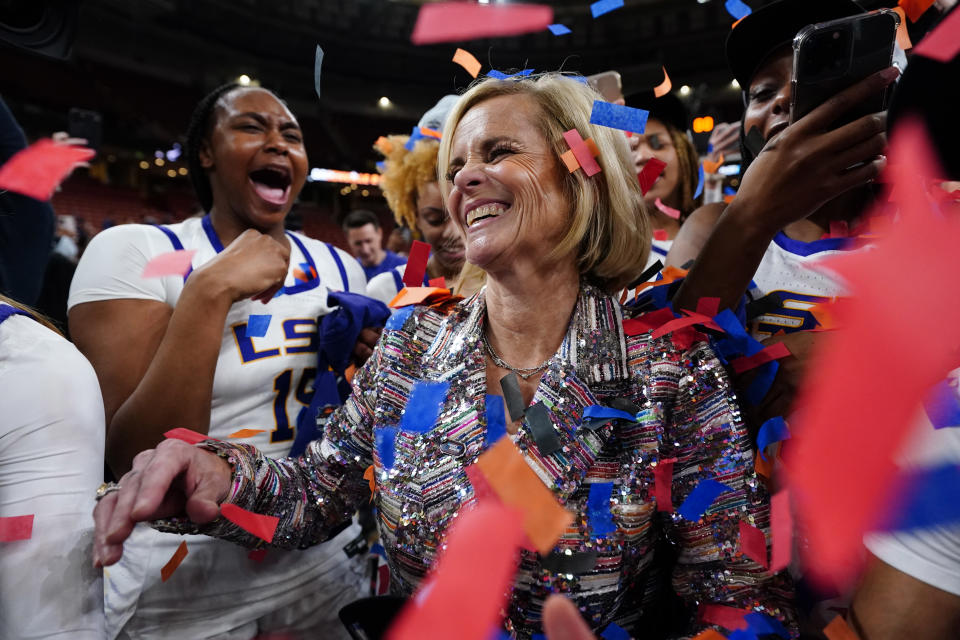 LSU head coach Kim Mulkey celebrates with her team after earning a spot in the Final Four of the NCAA women's tournament. (Jacob Kupferman/NCAA Photos via Getty Images)
