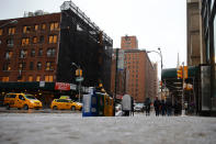 <p>The mixture of rain and snow make conditions slippery on roads and sidewalks in New York City on March 7, 2018. (Photo: Gordon Donovan/Yahoo News) </p>