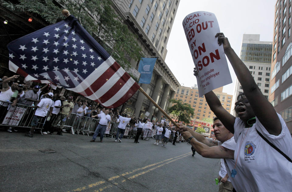 Locked-out workers demonstrate outside Consolidated Edison headquarters, in New York, Thursday, July 5, 2012. Consolidated Edison and the union representing its employees are returning to the bargaining table. Talks were scheduled to resume Thursday afternoon, while the picket lines in New York's Union Square grow. Pressure is mounting on both sides to resume negotiations after they failed last weekend. On Thursday, the company put out a full page ad blasting the union. (AP Photo/Richard Drew)