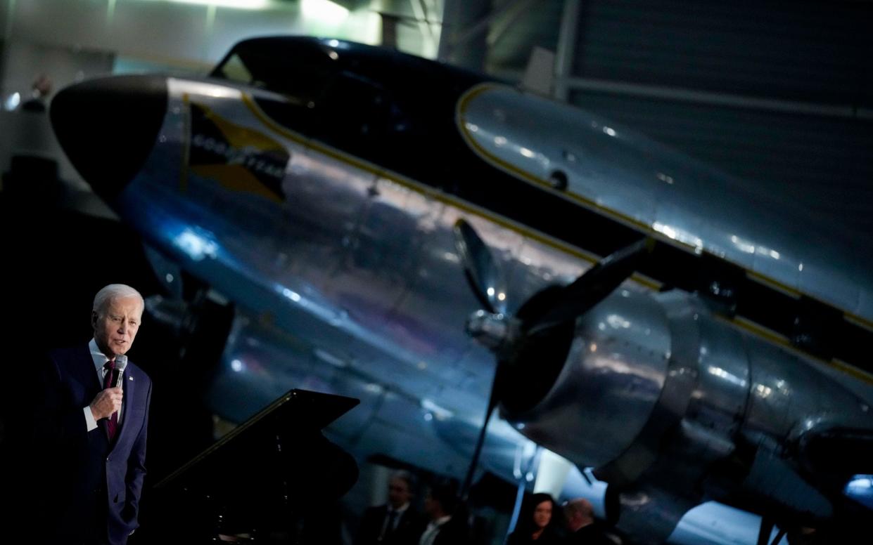 President Joe Biden speaks during a dinner at the Canadian Aviation and Space Museum in Ottawa on Friday - Andrew Harnik/AP 