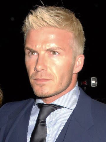 Sylvia Linares/FilmMagic David Beckham poses with platinum blonde hair.