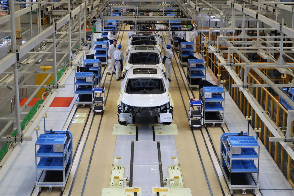 Workers are seen on the production line at Honda Motor's new joint venture plant with Dongfeng Motor Group in Wuhan, Hubei province, China April 12, 2019. REUTERS/Norihiko Shirouzu