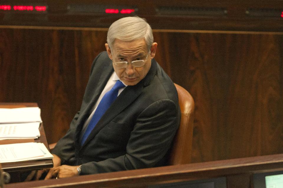 Isreal Prime Minister Benjamin Netanyahu attends a Knesset session in Jerusalem, Monday, Oct. 15, 2012. (AP Photo/Sebastian Scheiner)