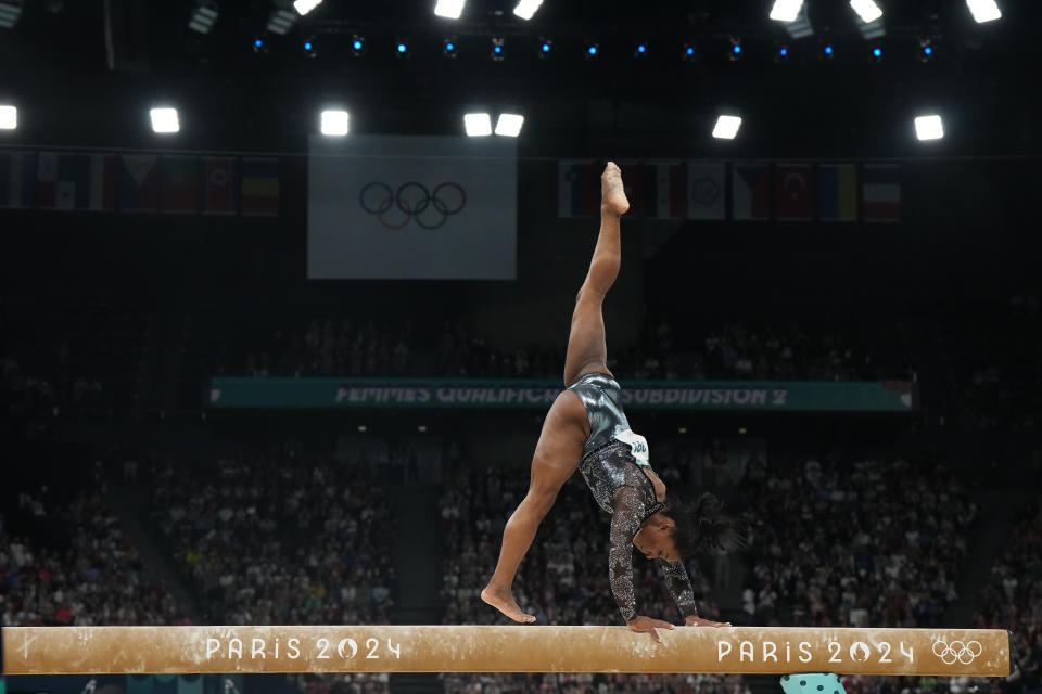 Gymnastics: 2024 Summer Olympics:  USA Simone Biles in action, performs on the Balance beam during Women's Qualification at Bercy Arena. 
Paris, France 7/28/2024
CREDIT: Erick W. Rasco (Photo by Erick W. Rasco/Sports Illustrated via Getty Images) 
(Set Number: X164555 TK1)