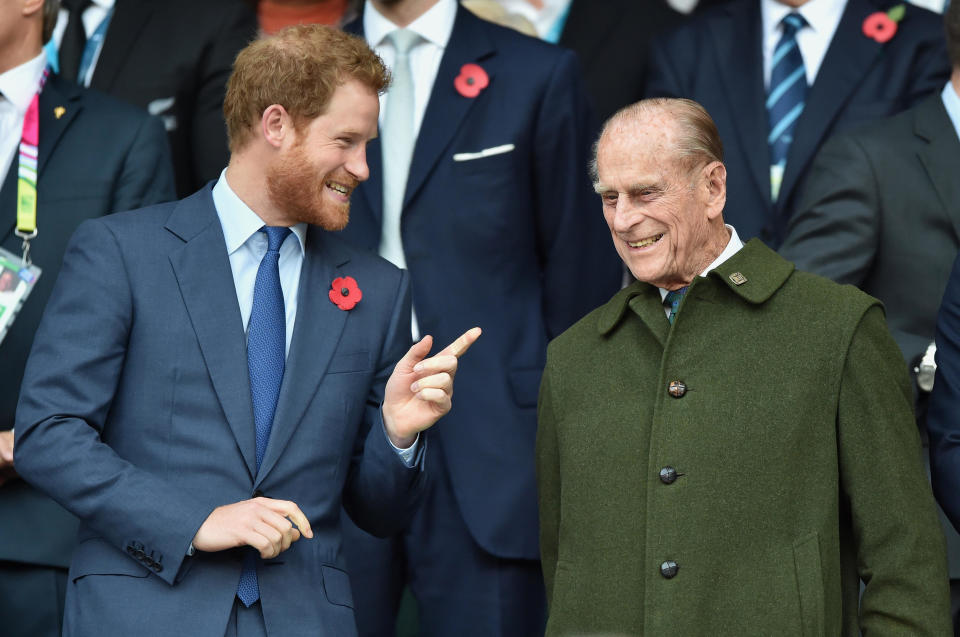 Prince Harry and Prince Philip attend the 2015 Rugby World Cup Final match between New Zealand and Australia at Twickenham Stadium on October 31, 2015 in London, England. / Credit: Max Mumby/Indigo / Getty Images