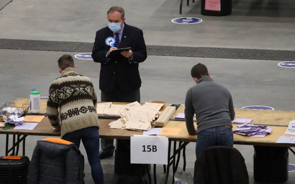 Any more for me? Alex Salmond checks in with the count in Aberdeen