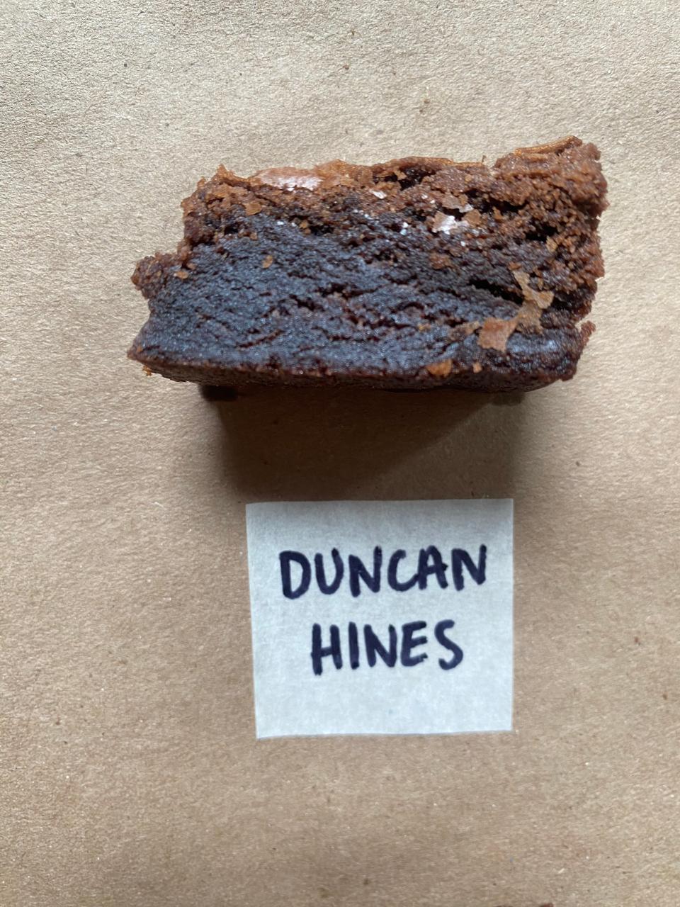 Piece of brownie with a label reading 