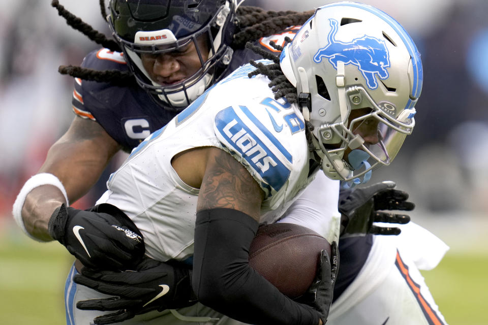 Chicago Bears linebacker Tremaine Edmunds tackles Detroit Lions' Jahmyr Gibbs during the second half of an NFL football game Sunday, Dec. 10, 2023, in Chicago. (AP Photo/Erin Hooley)