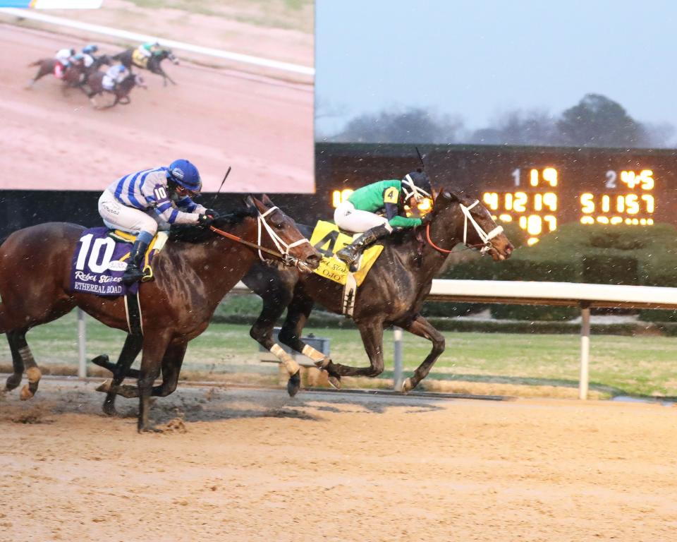 Un Ojo and jockey Ramon Vazquez hold off Ethereal Road to win the Rebel Stakes on Feb. 26 at Oaklawn Park in Hot Springs, Ark.