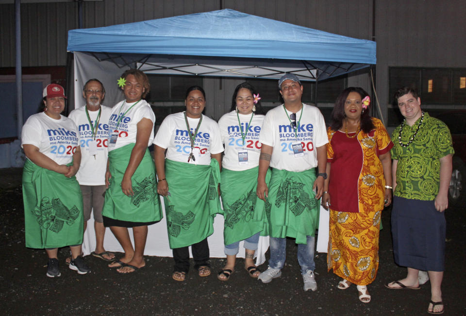 Supporters along with two US based officials for the Mike Bloomberg campaign gather on Tuesday, March 3, 2020, in Tafuna village near Pago Pago, American Samoa. Bloomberg spent more than $500 million to net one presidential primary win in the U.S. territory of American Samoa. His lone victory in the group of islands with a population of 55,000 was an unorthodox end to his much-hyped but short-lived campaign that ended Wednesday, March 4. (AP Photo/Fili Sagapolutele)