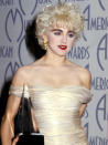 <div class="caption-credit"> Photo by: WireImage</div><div class="caption-title">Madonna</div>Always current, Madonna changes her look to suit her musical mood. However, we think that the platinum blonde curly crop she wore during her "Who's That Girl" world tour is one of The Material Girl's most iconic looks.