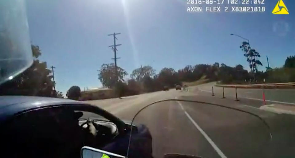 Police allege the vehicle abruptly cut in front of the officer’s motorbike. Source: Queensland Police Service