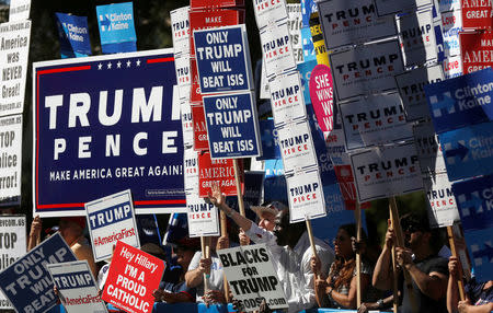 People gather during demonstrations on the campus of University of Nevada, Las Vegas, before the last 2016 U.S. presidential debate in Las Vegas, Nevada, U.S., October 19, 2016. REUTERS/Jim Urquhart