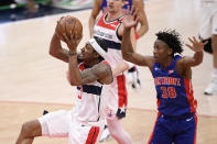 Washington Wizards guard Bradley Beal (3) goes to the basket past Detroit Pistons guard Saben Lee (38) during the first half of an NBA basketball game, Saturday, April 17, 2021, in Washington. (AP Photo/Nick Wass)