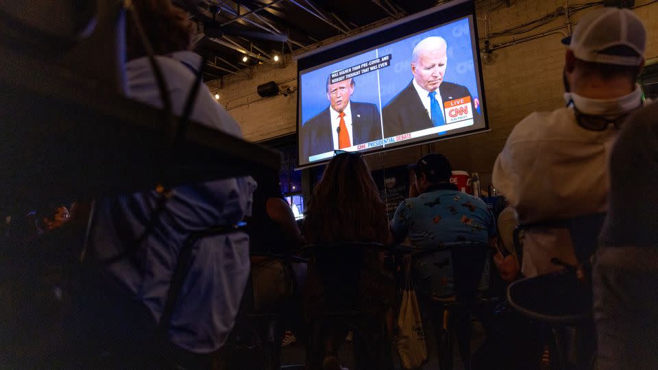 People watch the debate in Washington, DC. - Tristen Rouse/CNN