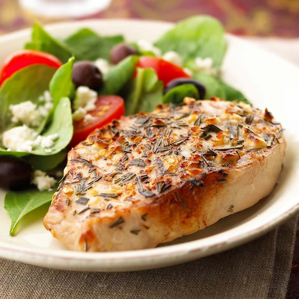 <p>Juicy and flavorful, these rosemary-garlic pork chops make for a filling main dish. Serve alongside mashed potatoes or a quick side salad for a delicious dinner. <a href="https://www.eatingwell.com/recipe/263155/rosemary-garlic-pork-chops/" rel="nofollow noopener" target="_blank" data-ylk="slk:View Recipe;elm:context_link;itc:0;sec:content-canvas" class="link ">View Recipe</a></p>