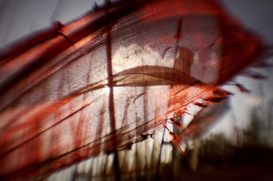 Tattered prayer flag in the wind, Chele La pass, Bhutan. <br><br>Camera: Canon 5D MkII <br><br>Richard Murai, USA <br><br>Winner, Best Single Image in a Natural Elements portfolio