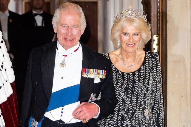 <p>Samir Hussein/WireImage</p> King Charles and Queen Camilla attend a reception and dinner in honor of their Coronation at Mansion House on October 18, 2023.