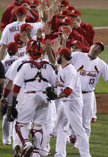 The Cardinals celebrate their Game 3 win on Wednesday. They just keep coming no matter how many times they're counted out