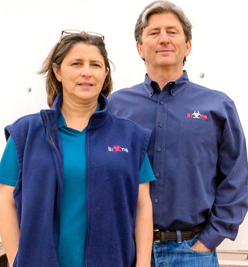 Michel and Marty Mayfield, from left, of Bio-One cleaning services pose for a photo in Oklahoma City, Okla. on Friday, March 18, 2022. 