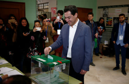 Andalusian regional People's Party (PP) leader and candidate Juan Manuel Moreno Bonilla casts his vote for the Andalusian regional elections at a polling station in Malaga, Spain, December 2, 2018. REUTERS/Jon Nazca