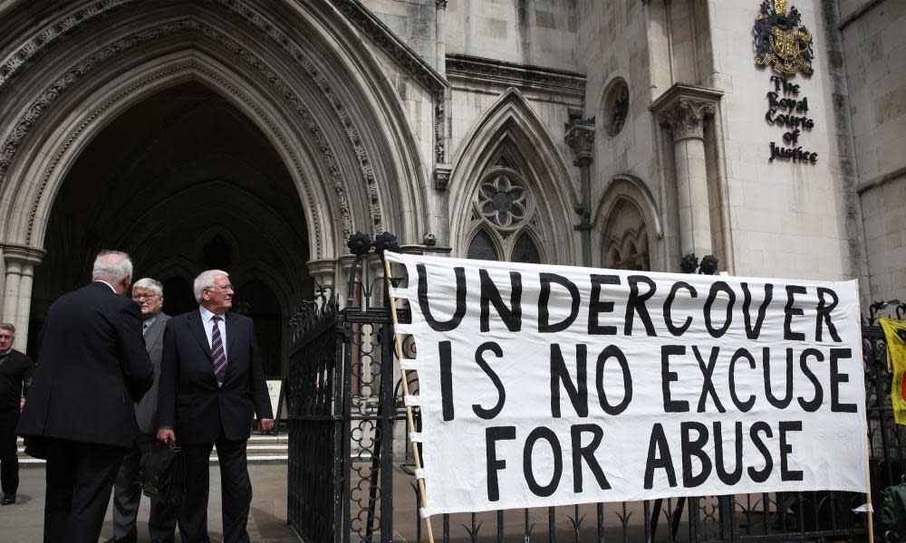 Banner outside the high court in London reads: 'Undercover is no excuse for abuse'