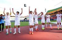Jun 20, 2015; Edmonton, Alberta, CAN; China celebrates after defeating Cameroon in the round of sixteen in the FIFA 2015 women's World Cup soccer tournament at Commonwealth Stadium. China won 1-0. Mandatory Credit: Erich Schlegel-USA TODAY Sports
