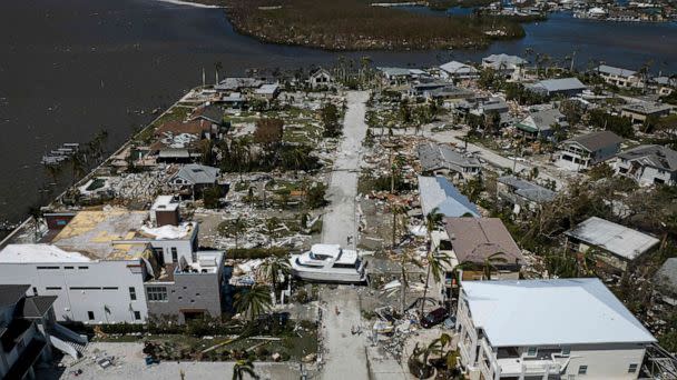 PHOTO: A boat sits in the middle of a street in the aftermath of Hurricane Ian in Fort Myers, Fla., Sept. 29. 2022. (Ricardo Arduengo/AFP via Getty Images)