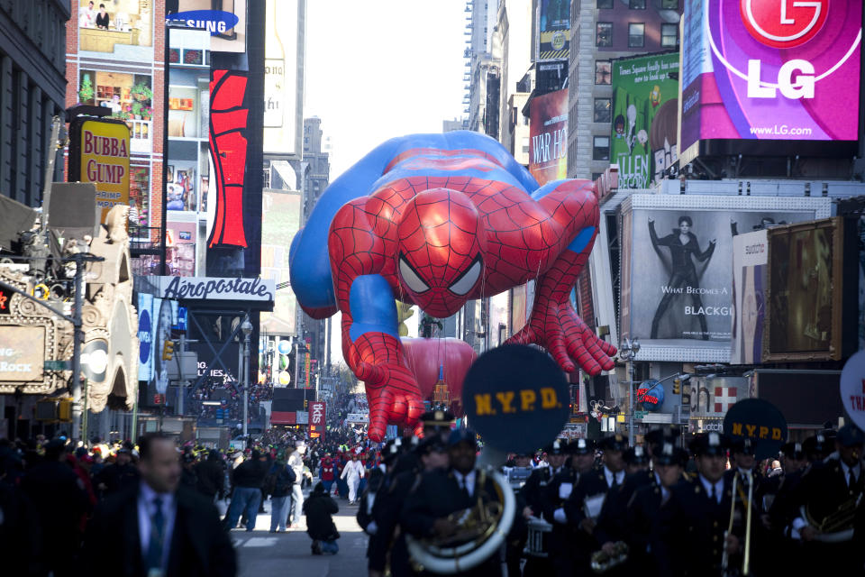 The Spider-Man balloon makes its way through Times Square in Macy's Thanksgiving Day parade on November 24, 2011 in New York City. The 85th annual event is the second oldest Thanksgiving Day parade in the U.S. (Photo by Michael Nagle/Getty Images)