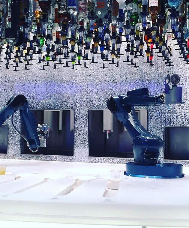 These robot bartenders know how to make a killer cocktail every time. Photo: Be