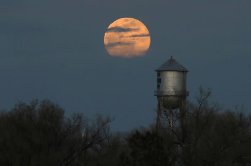 A Supermoon rises over the town of Nunn