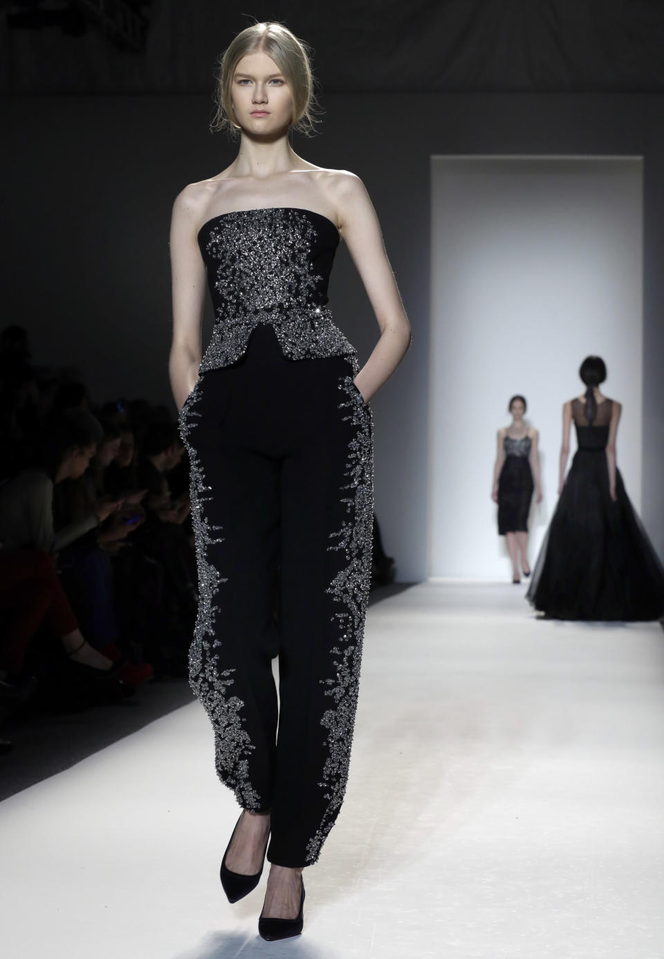 The Jenny Packham Fall 2013 collection is modeled during Fashion Week in New York on Tuesday, Feb. 12, 2013. (AP Photo/Richard Drew)