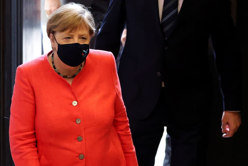 German Chancellor Angela Merkel wearing a face mask arrives to attend a session at the upper house of the German parliament Bundesrat, following the outbreak of the coronavirus disease (COVID-19), in Berlin