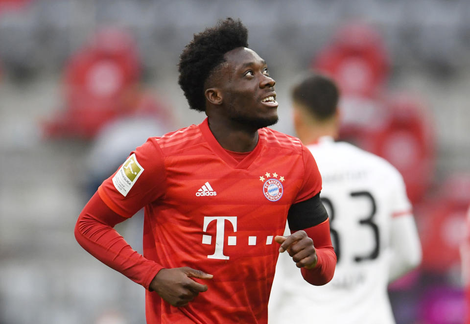 Bayern Munich's Canadian midfielder Alphonso Davies celebrates scoring his team's fourth goal during the German first division Bundesliga football match between FC Bayern Munich and Eintracht Frankfurt on May 23, 2020 in Munich, southern Germany. (Photo by ANDREAS GEBERT / POOL / AFP) / DFL REGULATIONS PROHIBIT ANY USE OF PHOTOGRAPHS AS IMAGE SEQUENCES AND/OR QUASI-VIDEO (Photo by ANDREAS GEBERT/POOL/AFP via Getty Images)