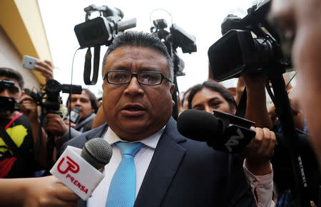 Erasmo Reyna, the lawyer of former Peruvian President Alan Garcia, talks to the media outside Garcia's home after Uruguay rejected a request for asylum to Garcia, in Lima, Peru December 3, 2018 REUTERS/Guadalupe Pardo