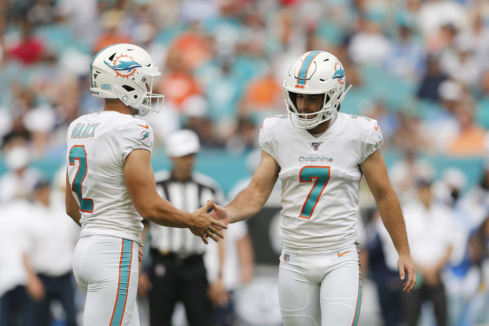 Jason Sanders (#7) and Matt Haack (#2), seen here earlier in the season, pulled off a sweet trick play against the Eagles on Sunday. (Photo by Michael Reaves/Getty Images)