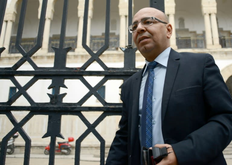 Tunisian lawyer Fadhel Mahfoudh leaves the courthouse in the capital Tunis on October 9, 2015, after he was awarded the 2015 Nobel Peace Prize with other members of Tunisian National Dialogue Quartet