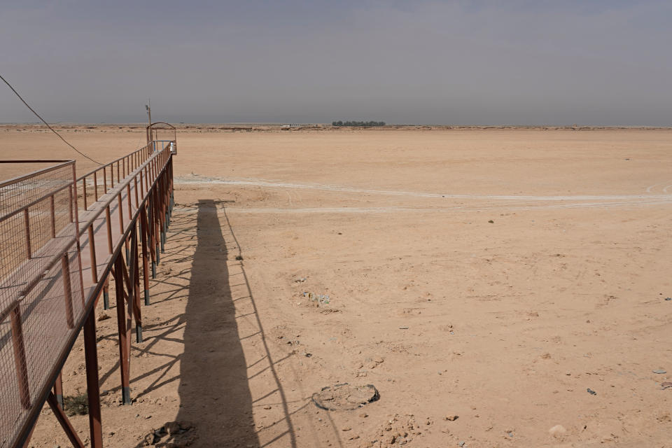 A general view of the dried up Lake Sawa Iraq, is seen Saturday, June 4, 2022. This year, for the first time in its centuries-long history, Sawa Lake dried up completely. A combination of mismanagement by local investors, government neglect and climate change has ground down its azure shores to chunks of salt. (AP Photo/Hadi Mizban)