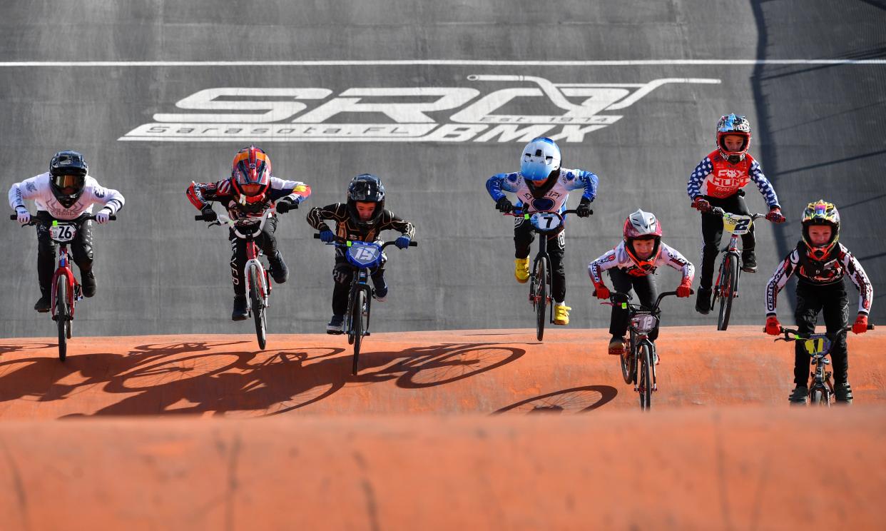 Competitors in the 9-10 boys 20" class get in some practice runs Friday morning before the afternoon races start.