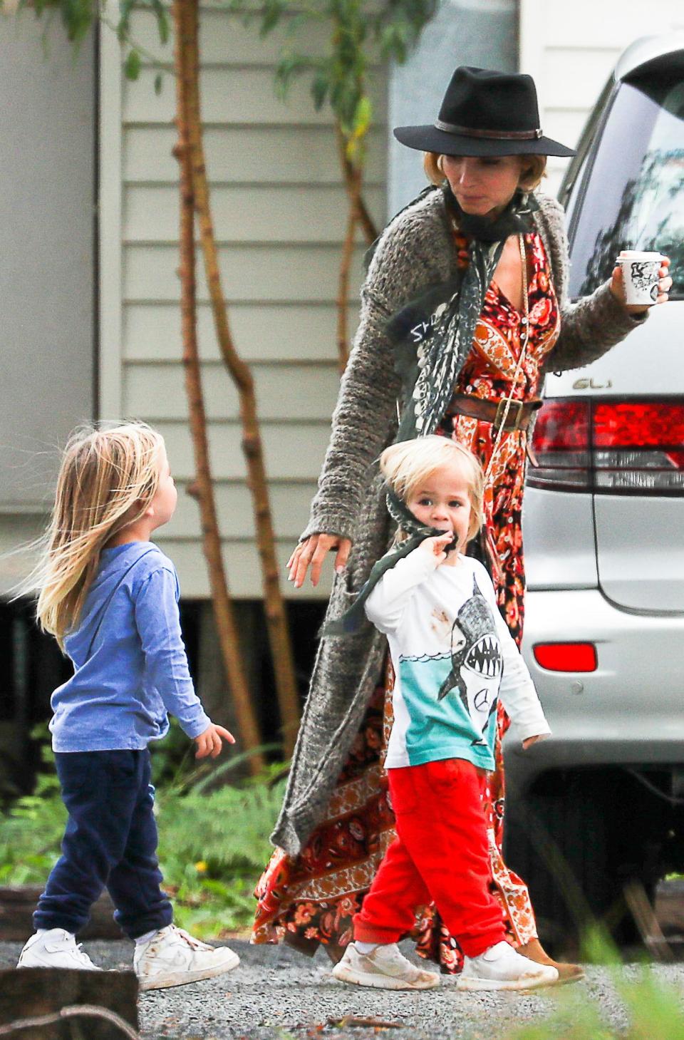 Chris Hemsworth comforts daughter on family day out in Byron Bay
