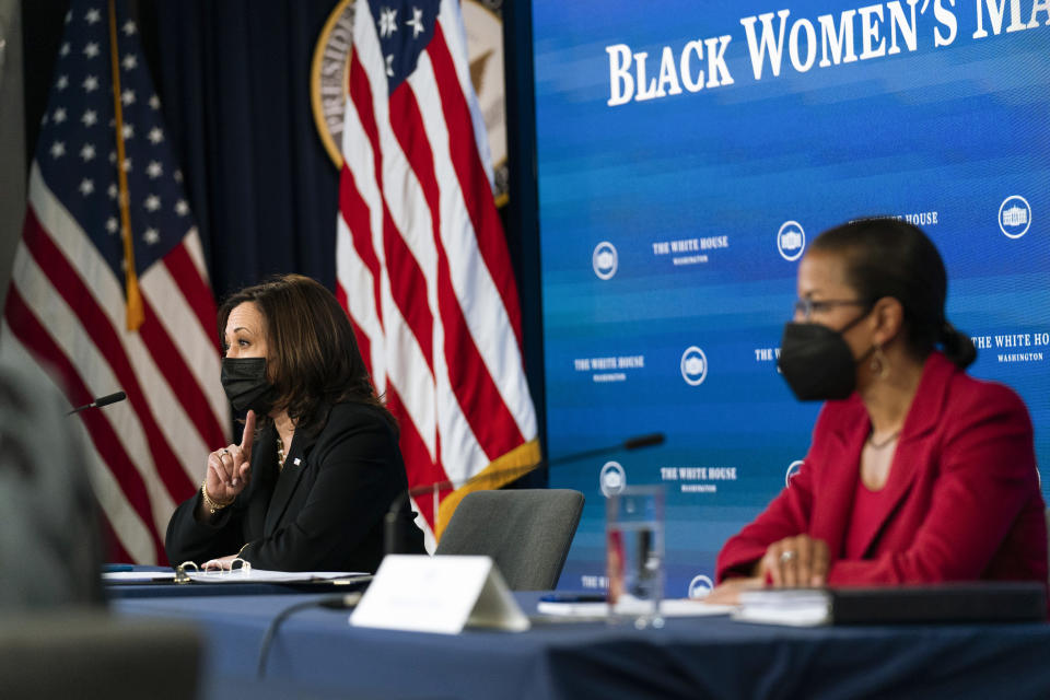 Vice President Kamala Harris, left, and White House Domestic Policy director Susan Rice, participate in a roundtable discussion highlighting the disparities that Black women face in maternal health at the Eisenhower Executive Office Building on the White House complex in Washington, Tuesday, April 13, 2021. (AP Photo/Manuel Balce Ceneta)