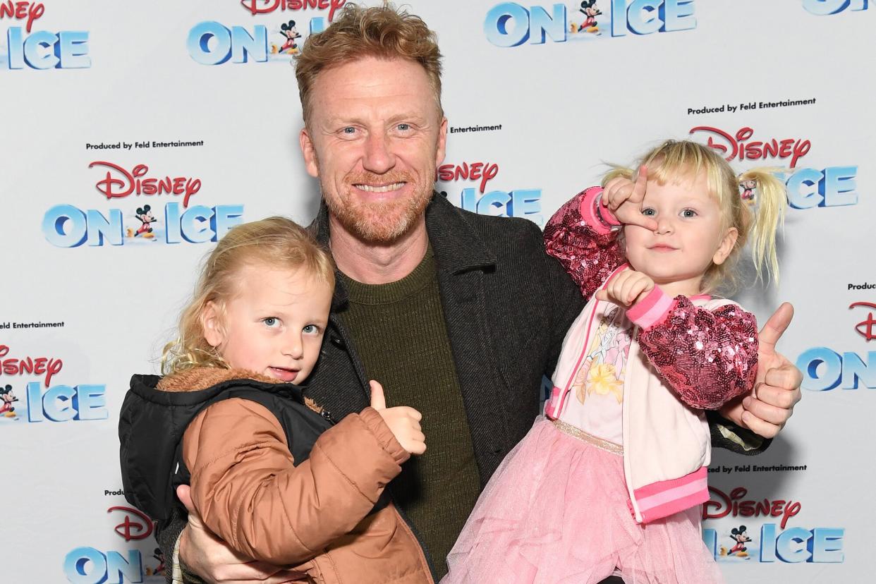 Kevin McKidd (C) and kids arrive as Disney On Ice presents Road Trip Adventures at Crypto.com Arena on December 09, 2022 in Los Angeles, California.