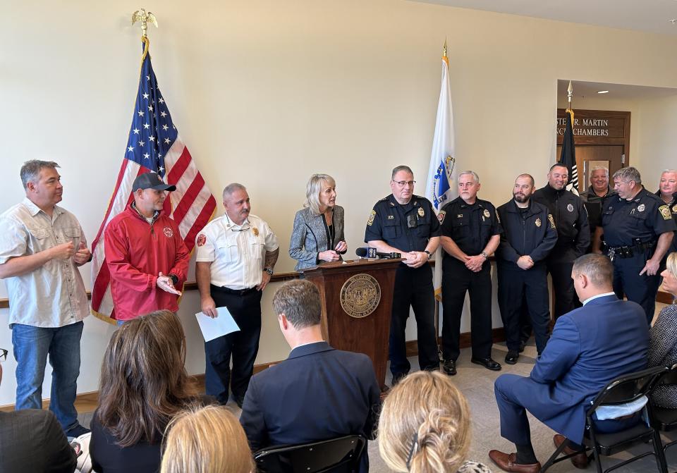 Taunton Mayor Shaunna O'Connell describes her administration's plan to create a combined police and fire department 911 emergency dispatch system during a press conference at City Hall on Oct. 11