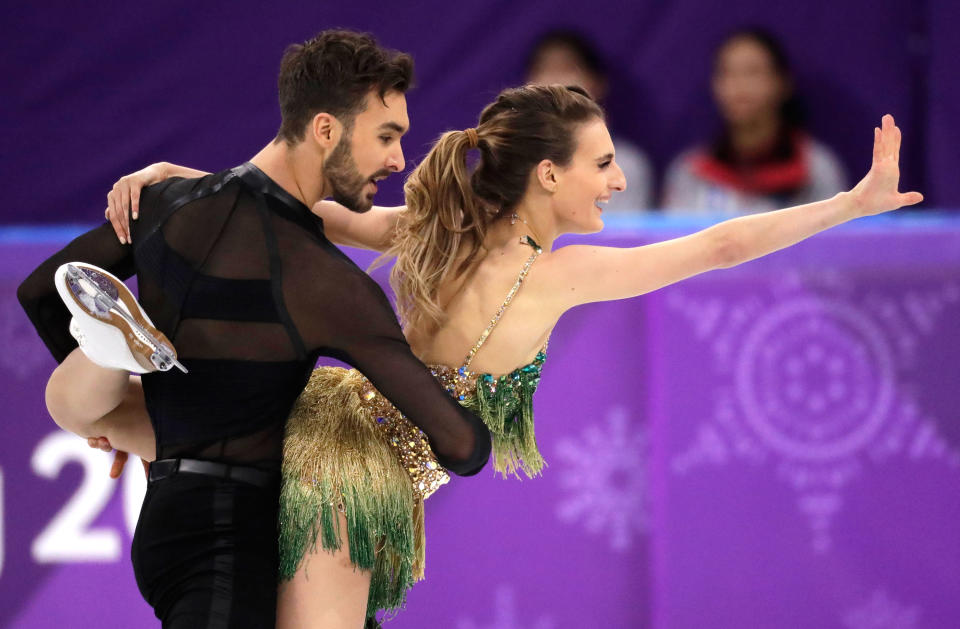 <p>Gabriella Papadakis and Guillaume Cizeron of France perform during the ice dance, short dance figure skating in the Gangneung Ice Arena at the 2018 Winter Olympics in Gangneung, South Korea, Monday, Feb. 19, 2018. (AP Photo/Bernat Armangue) </p>