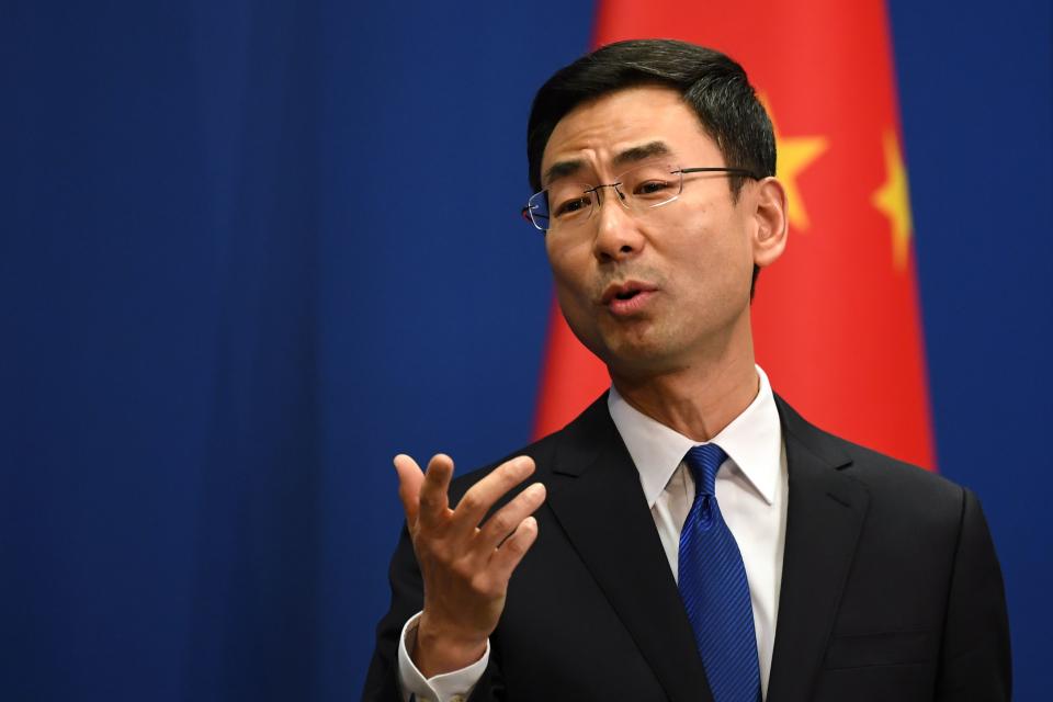 Chinese Foreign Ministry spokesman Geng Shuang speaks during the daily press briefing in Beijing on March 18, 2020. - China on March 18 announced it would expel American journalists from three major US newspapers in one of the communist government's biggest crackdowns on the foreign press, escalating a bitter row over media freedoms. (Photo by GREG BAKER / AFP) (Photo by GREG BAKER/AFP via Getty Images)