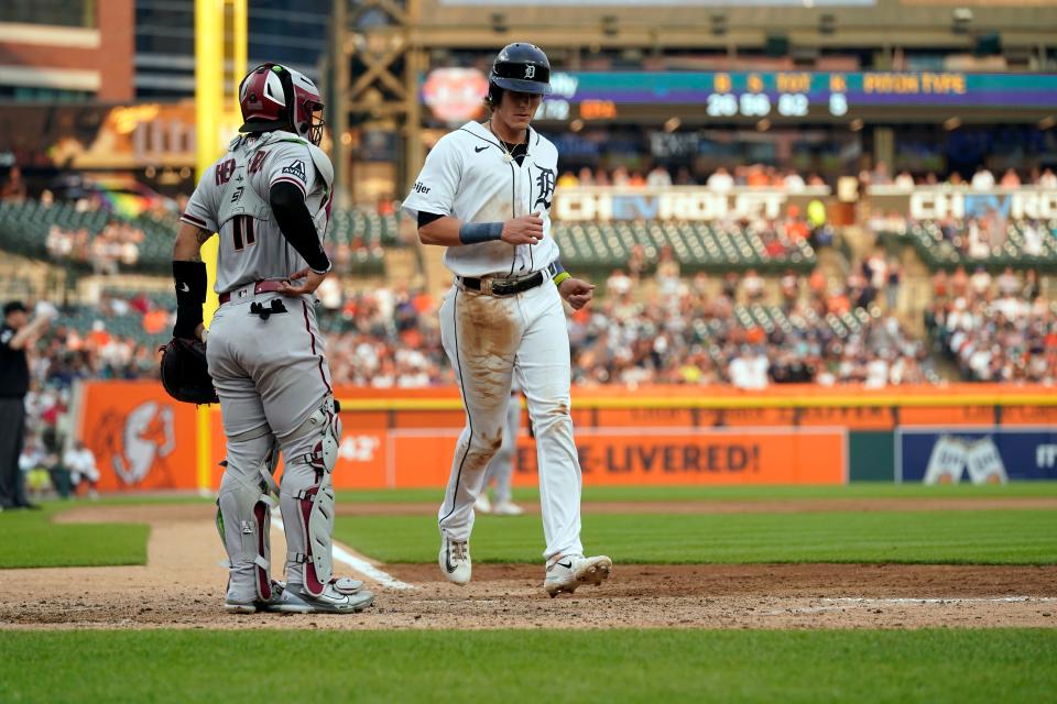 Detroit Tigers' Nick Maton scores from third on a sacrifice hit by Zack Short during the sixth inning of a game against the Arizona Diamondbacks at Comerica Park in Detroit on Friday, June 9, 2023.
